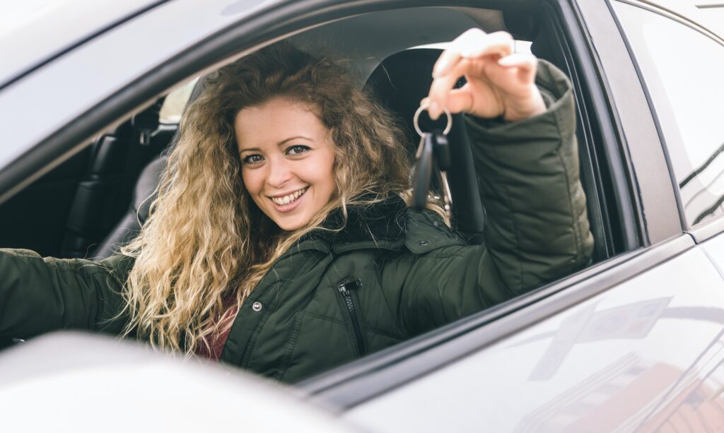 Woman showing the car keys