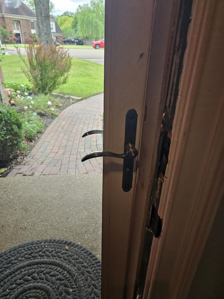 Measuring Larson storm door lock hardware for rekeying in Cordova, TN