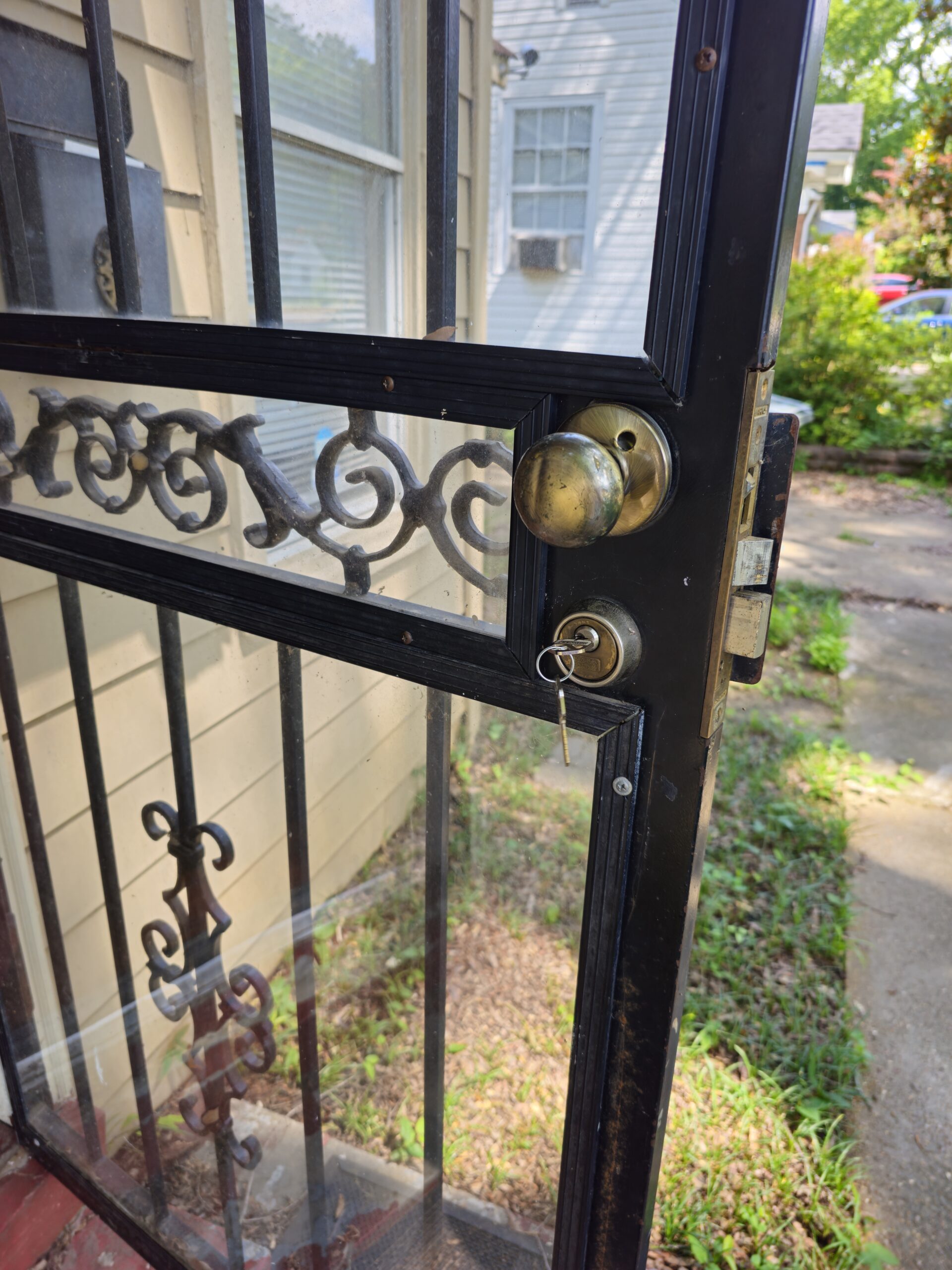 Marks cylinder removed during rekeying on a rear entry door
